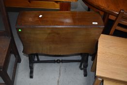 A Sutherland style drop leaf side table in mahogany