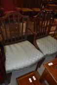 A pair of Regency style chair, one dining/one carver