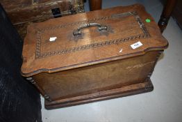 An Antique hand crank sewing machine, The Weaver, with wooden case