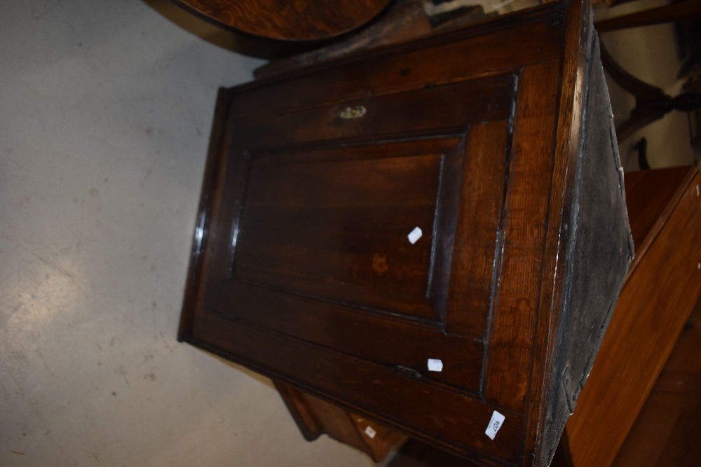 A period oak corner cupboard