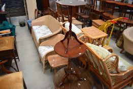 Two small pedestal base wine tables in stained mahogany