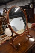 A Victorian mahogany toilet mirror