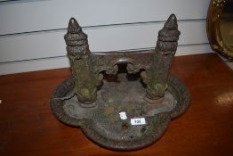 An antique cast iron boot scraper, From the estate of the late Cedric Robinson, Guide over the