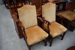 a pair of modern mahogany famed easy arm chairs