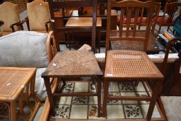 Two salon style chairs one having rattan seat and similar woven fibre chair