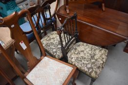 A pair of Victorian ebonised bedroom chairs