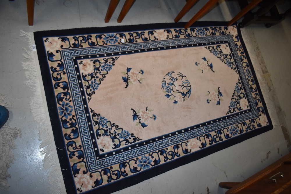 A modern fireside rug, approx. 150 x 90cm
