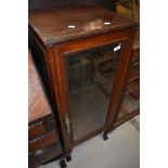 A late 19th or early 20th Century mahogany narrow display cabinet