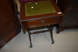 A reproduction Regency lyre end occasional table