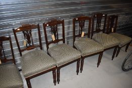 A set of six 19th Century mahogany salon/dining chairs having later upholstered seats and turned