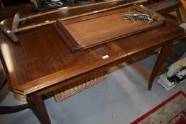 A vintage sapele extending dining table