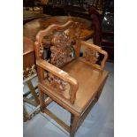 An Oriental hardwood carver chair