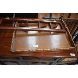 An Edwardian fold out hook rack and an oak butlers tray