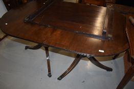 A Regency revival extending dining table