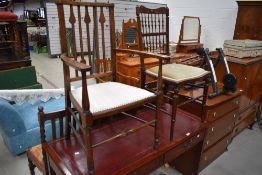 Two Victorian salon style chairs one having turned and shaped frame and the other with spindle