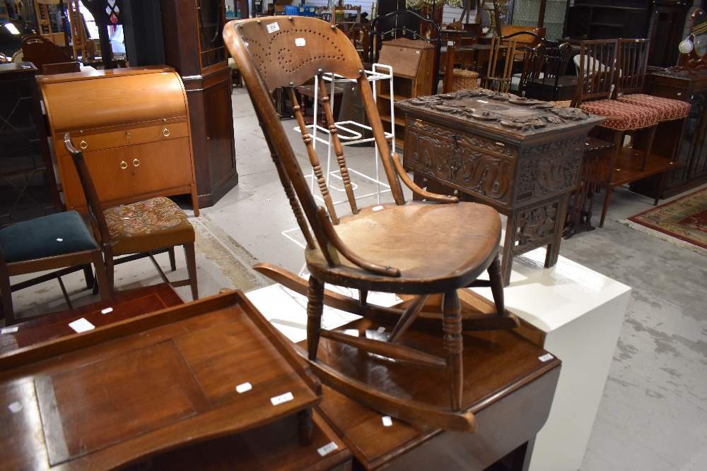 A Victorian stained frame low rocking chair