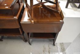 An early to mid 20th Century stained frame tea trolley
