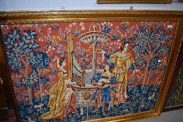 A large gilt framed woolwork tapestry depicting classical maidens and minstral