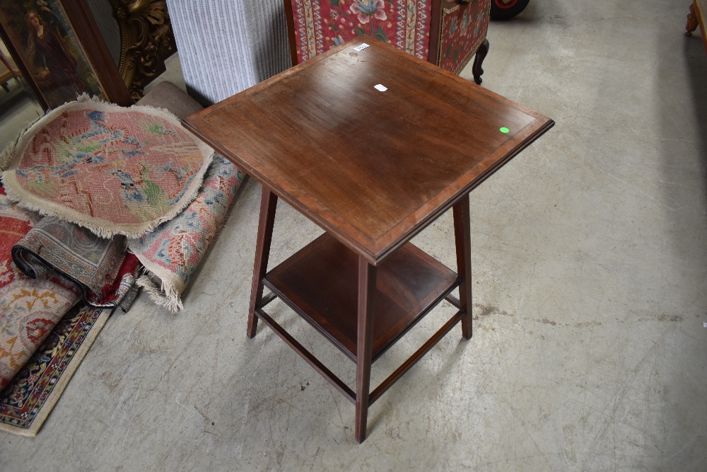 A Victorian centre or occasional table having veneer inlayed top