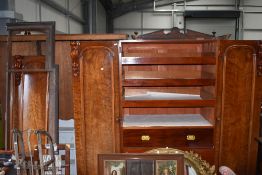 An impressive double breasted Victorian wardrobe with drawer chest having acanthus leaf decoration