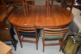 A mid century set of five dining chairs with matching table possibly G plan or similar