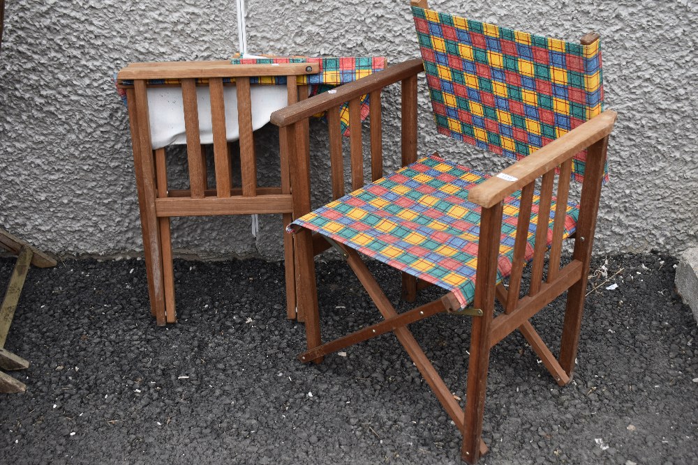 A pair of directors style fold away picnic chairs