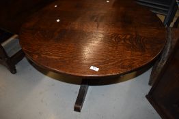 A traditional oak coffee table, in the Titchmarsh and Goodwin style, diameter approx. 90cm