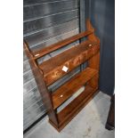 A traditional pine wall shelf