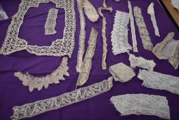 A mixed lot of antique lengths and sections of lace, crotchet and similar, some exquisite pieces