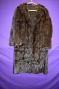 A dark brown dyed squirrel coat, approx 1930s.