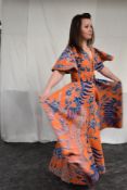 A vintage Batik evening dress having orange ground with bold blue and white design, Made in