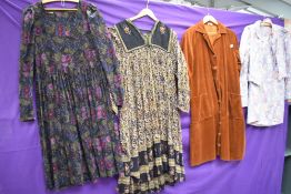 A selection of vintage dresses including Laura Ashley examples.