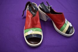 A pair of colourful 1970s platform shoes.