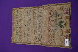 A Georgian sampler dated 1781 by Hannah Rider, using animals, numbers and alphabet.