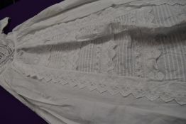 A Victorian christening gown using a variety of intricate techniques including embroidery and layers