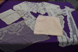 A mixed lot of antique items including modesty panels, lace work collars/shawl and a 1916 dated