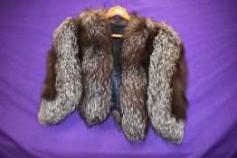 A 1940s fox fur capelet lined in black satin.