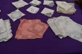 A set of linen napkins and table cloth having drawn thread work, similar sets of embroidered