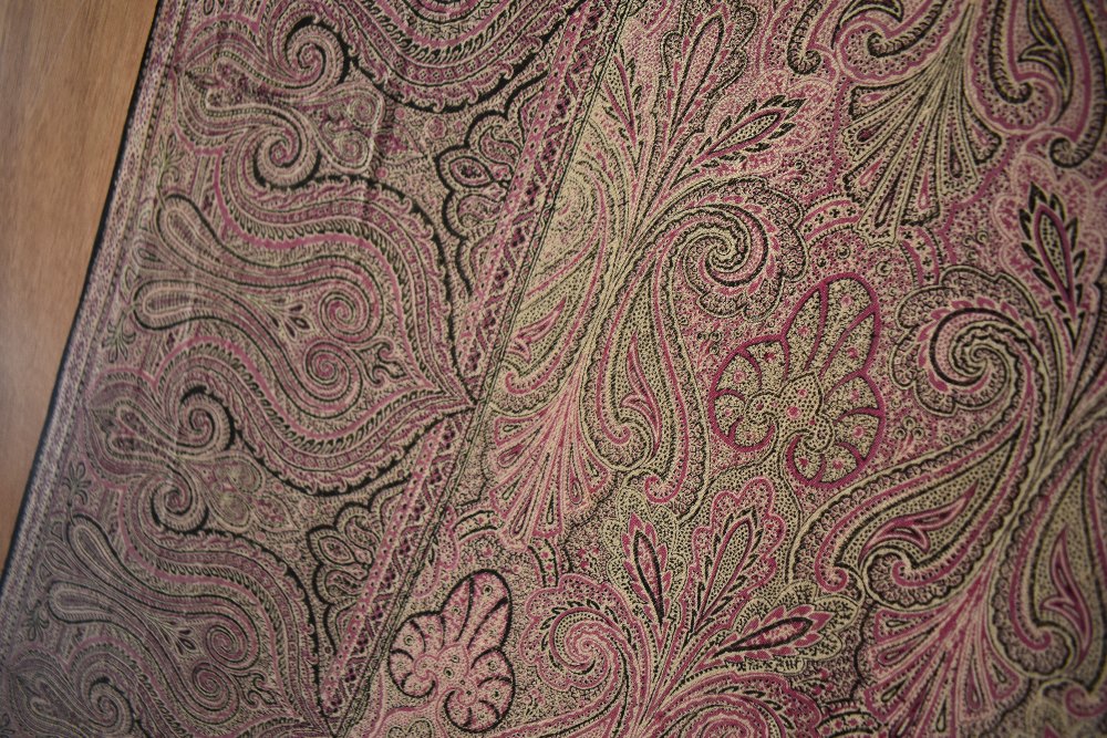 A circa 1970s crinoline shawl having paisley printed pattern in dark pink and black with fringed - Image 3 of 3