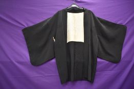 A 1950s gents silk damask Hoari Samurai kimono jacket worn over wedding kimonos having cream silk