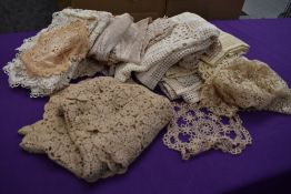 A large collection of crochet work and a section of intricate tatting.