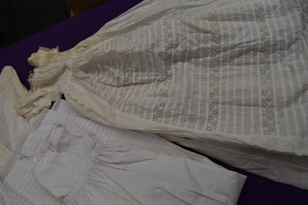 Three Victorian christening gowns using delicate lace work,cut work and pintucks. - Image 2 of 4