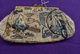 A 1930s intricately braided and embroidered French clutch bag having blue glass bead detail to