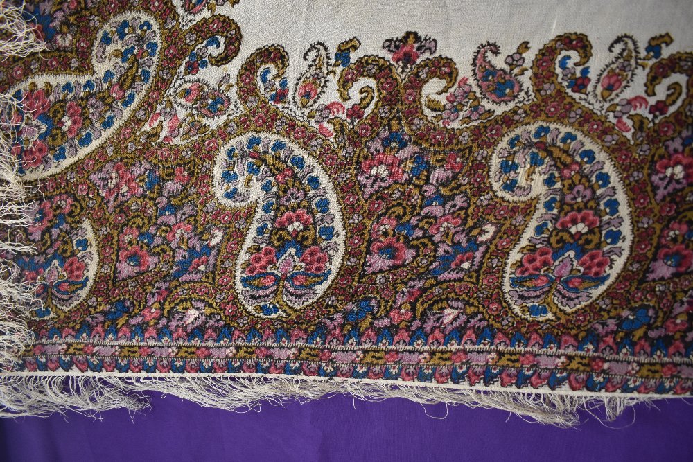 A beautifully bright late 19th/early 20th century fringed silk shawl having block printed pattern in - Image 2 of 5