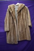 A 1960s blonde mink coat of shorter length, M Fletcher, Southport label.