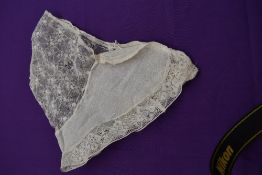 A 19th century lace widows cap or bonnet.