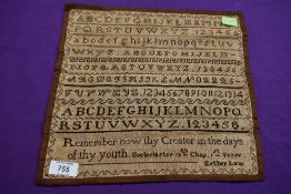 An antique undated sampler, a very neat example of letters,numbers and text.