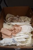 A box full of mixed vintage table linen included are embroidered examples and lace and crotchet