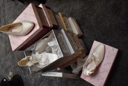 Ten pairs of unused bridal shoes in original packaging, various styles and sizes.