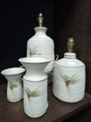 A group of four John warren (Lyme Regis) studio pottery wares, two table lamps and two vases.